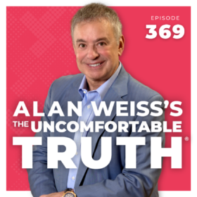 alan weiss in gray suit with bright pink background