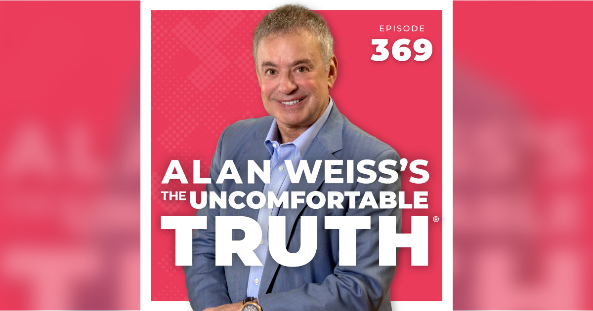 alan weiss in gray suit with bright pink background